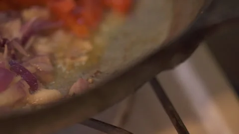 Frying The Vegetable Mixture In A Frying Pan, On A Gas Stove. Stock Footage 258286570