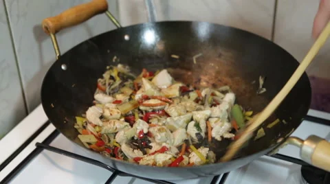 Frying vegetables and chicken meat Stock Footage 58162968