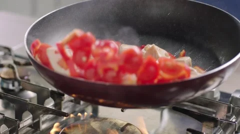 Frying vegetables and chicken white meat. Stock Footage 46467924