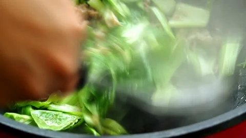 Frying vegetables with minced pork  in pan , Thai famous food Stock Footage 220904789