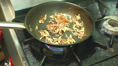Frying vegetables in pan Stock Footage 35733524