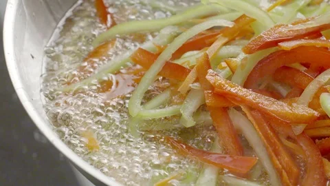 Frying vegetables on the pan Video stock 70059153