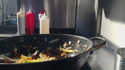 Frying vegetables - slow motion Видео 58183559