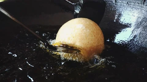 Frying very Big Doughnut In Pan i Stock Footage 132072429