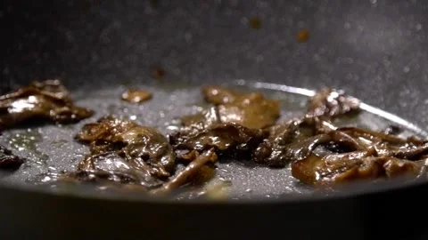 Frying White mushroom close up Stockbeeldmateriaal 141992476