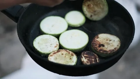 Frying Zucchini on Campfire Stock-Footage 284673787