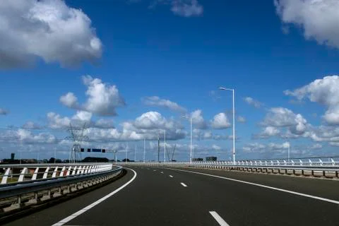 FS 5120 Image of Empty Freeway  under a bright blue sky. Stock Photos