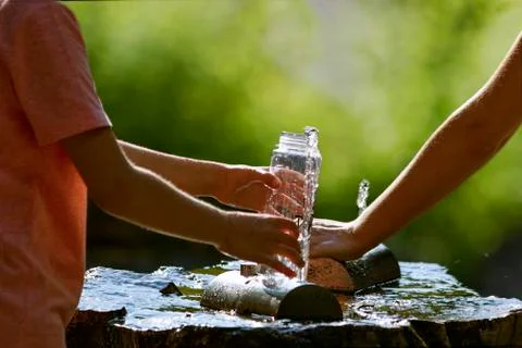 FS 7591  Potable source water on hot  sunny summer day. 库存照片