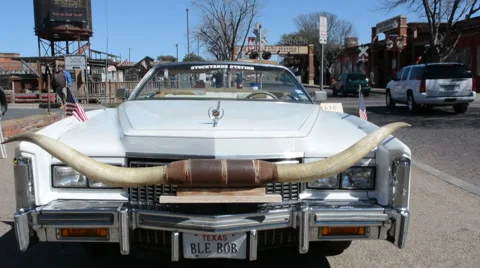 Ft Worth Texas Main Street Cadillac with longhorns on grill for tourists near 스톡 동영상 45209955