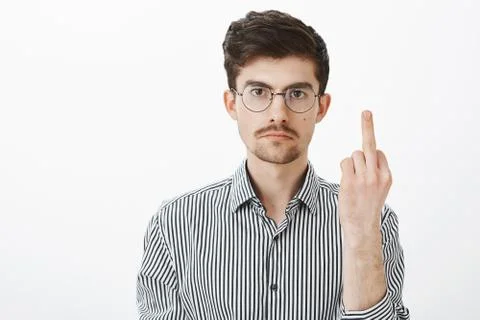 Fuck off, man, I am not your slave. Annoyed serious adult male with bristle and Stock Photos