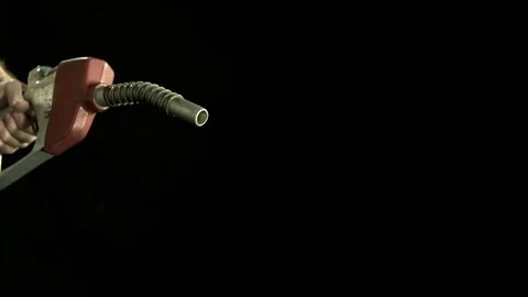 Fuel being sprayed out of the gun nozzle in slow motion Stock Footage 81217584