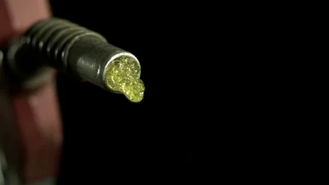 Fuel being sprayed out of the gun nozzle in slow motion Stock Footage 81219360