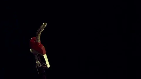 Fuel falling out of the gun nozzle in slow motion Stock Footage 81216613