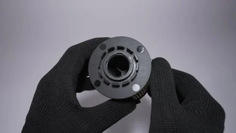 The fuel filter component is designed for use with black gloves 库存影片 303811431