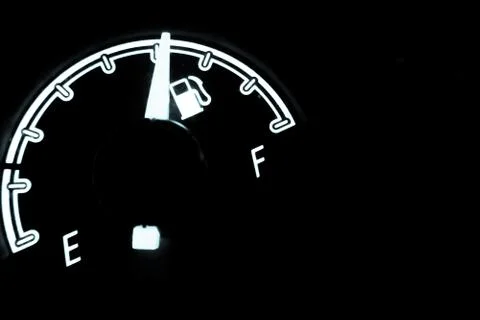 Fuel level check inside a car Fotos Stock