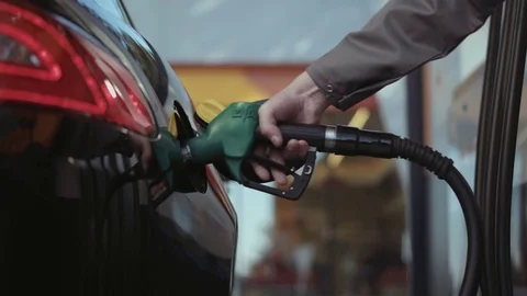 Fuel is poured into the tank Video stock 76883807