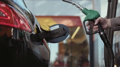 Fuel is poured into the tank Stock Footage 76883815