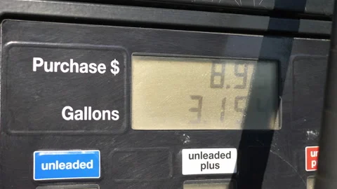 Fuel Pump Counting Dollars in 4K Video stock 88339890