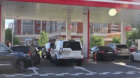 Fuel queues and price differences emerge at some stations around Moscow Stock Footage 337394414