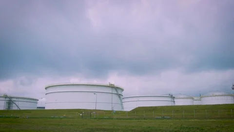 Fuel Storage with Moody Clouds Stock Footage 82750419