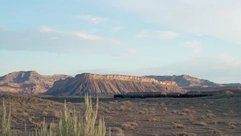 Fuel tanker train moving through the U.S. desert Stock Footage 342061009