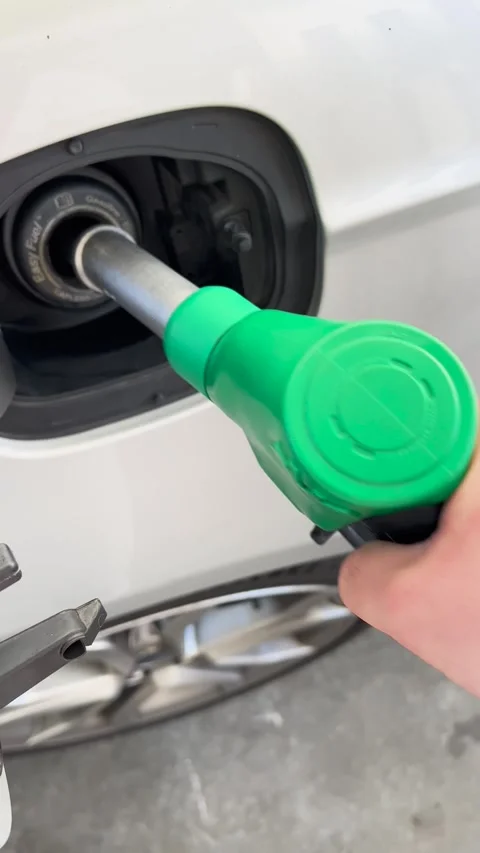 Fueling Up The Process of Refueling a Car at a Gas Station for Daily Driving Stock Footage 307425143