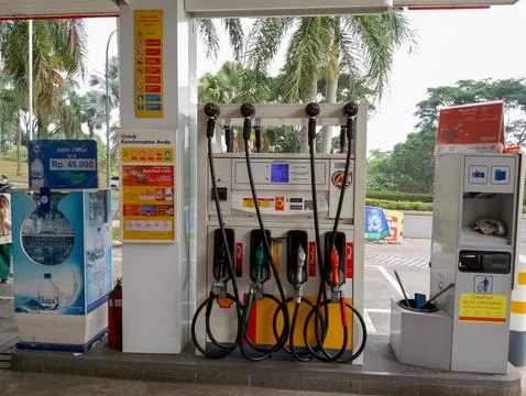 Fueling Up at the Shell Station Stock Photos