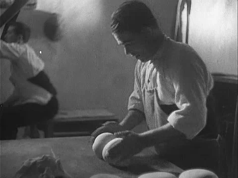 In Fuentiduena, Spain, bakers make bread while men head out on their donkeys Stock Footage 75184067