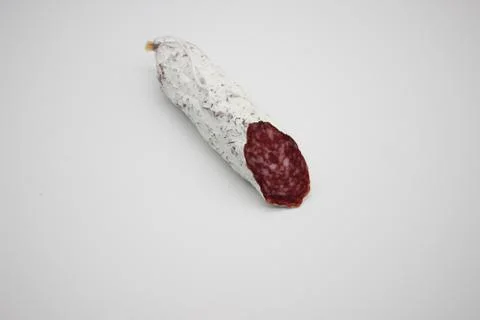 Fuet Is A Catalan Thin, Dry Cured, Sausage Of Pork Meat In A Pork Gut. Stock Photos