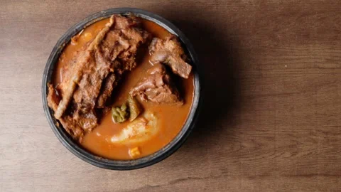 Fufu With Smoked Fish Light Soup and Goat Meat, Africa Ghana Traditional Dish Video stock 346249372