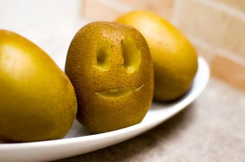 Fuit faces - kiwi Stock Photos