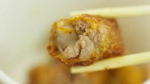 Fujian Five-Spice Meat Roll Held by Chopsticks Stock Footage 312588301