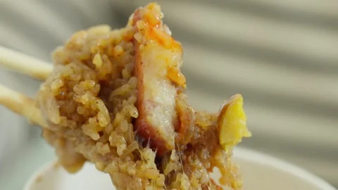 Fujian Savory Rice Dumpling Close-Up — Sticky Glutinous Texture and Rich Filling Stock Footage 312588400
