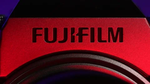 Fujifilm camera on neon lights. X-T4 model, Fuji lenses for photography, vide Stock Footage 172467288