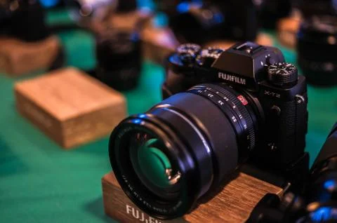 Fujifilm XT-2 with a lens 16-55 with grip at the company's stand on Rhoto For Stock Photos