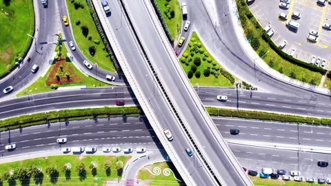 Full aerial downward approaching view of vehicles and highway in traffic Stock Footage 242390055
