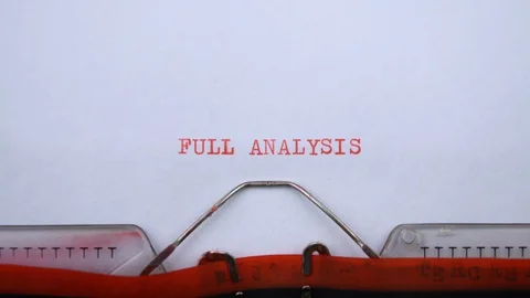 Full analysis - phrase printed on an old typewriter in red letters, close up. Stock Footage 129535825