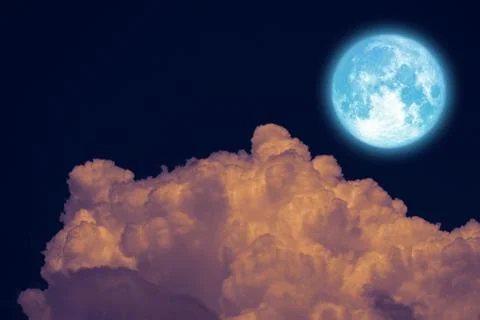 Full Beaver Moon back dark orange cloud on night sky Stock Photos