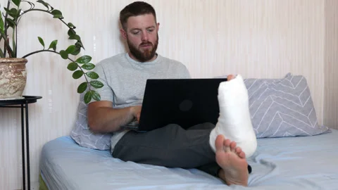 Full body of bearded man typing on laptop doing research. Stock Footage 156705058