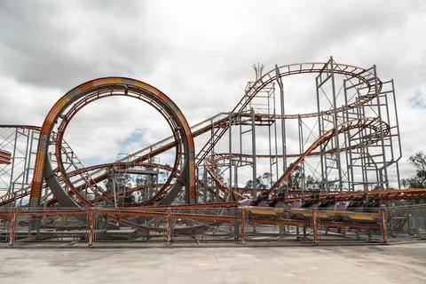 Full body roller coaster on a cloudy day Stock Photos