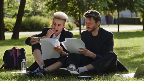 Full body view of two successful lawyers partners working on lunch outdoor Stock Footage 252608516
