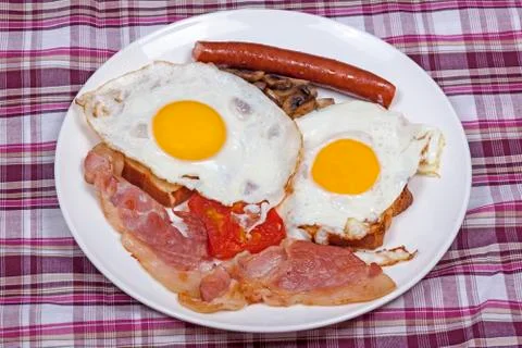 Full Breakfast of Bacon and Eggs on Toast Stock Photos