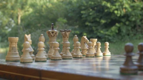 Full chess board. Close up of figurines on Chessboard outside Stock-Footage 118741675