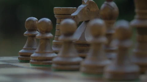 Full chess board. Close up of figurines on Chessboard outside Stock Footage 118745056