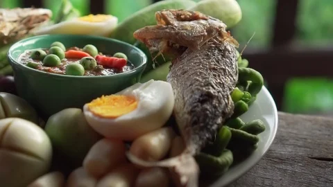 Full course of chili paste and fried mackerel with fresh vegetables. turmeric, . Stock Footage