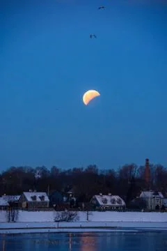 Full eclipse of moon ended. Partial eclipse of moon. Fotos Stock