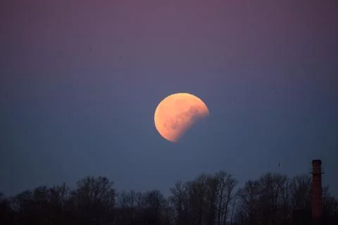 Full eclipse of moon ended. Partial eclipse of moon. Fotos Stock