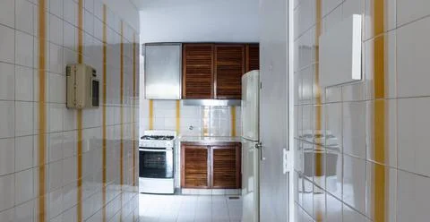 Full empty kitchen house room on 80's style design and natural light Stock Photos