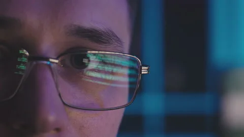 Full face of a programmer close-up Видео 179483616