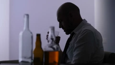 Full-fledged alcoholic drinking alone at home Stock Footage 96201111